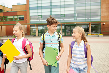 Image showing group of happy elementary school students walking