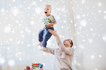 Image showing father with son playing and having fun at home