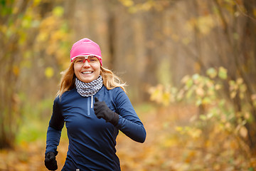 Image showing Portrait of beautiful female athletes on jogging