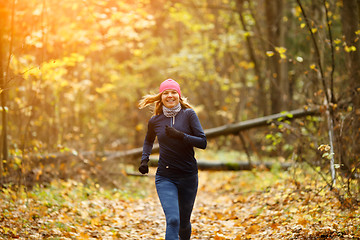 Image showing Blonde woman running in morning