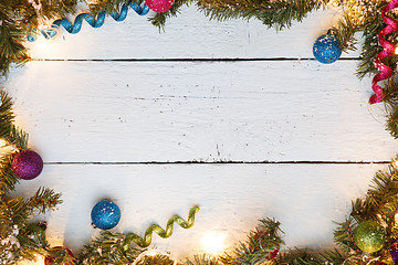 Image showing Template Christmas frame with wooden surface and decorations