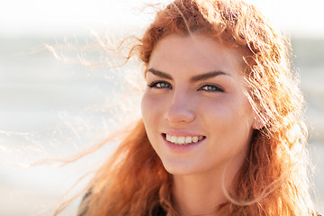 Image showing close up of happy young redhead woman face