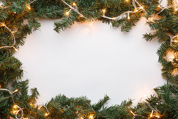 Image showing Branches of conifer with garland