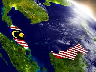 Image showing Malaysia with flag in rising sun