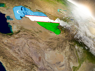 Image showing Uzbekistan with flag in rising sun