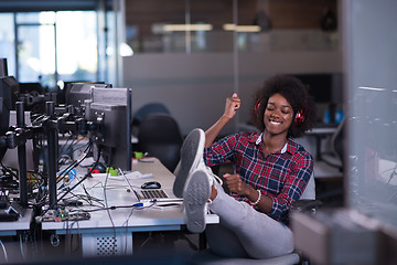 Image showing portrait of a young successful African-American woman in modern 