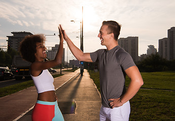 Image showing multiethnic group of people on the jogging