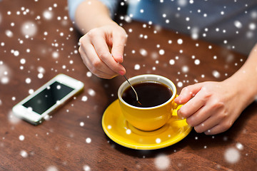 Image showing  woman with smartphone and coffee