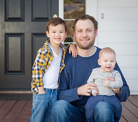 Image showing Mixed Race Father and Sons on Front Porch