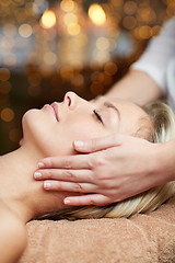 Image showing close up of woman having face massage in spa