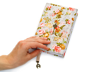 Image showing Handmade notebook with horseshoe bookmark