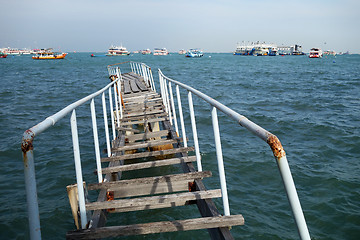 Image showing The wooden bridge extending into the sea