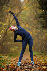Image showing Girl on engaged in stretching