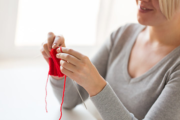 Image showing woman hands knitting with needles and yarn