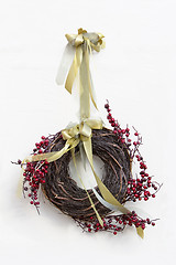 Image showing Advent Christmas wreath on white door decoration