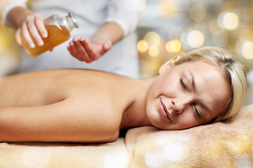 Image showing close up of woman lying on massage table in spa