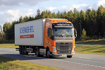 Image showing Orange Volvo FH 420 Semi Trailer on Motorway