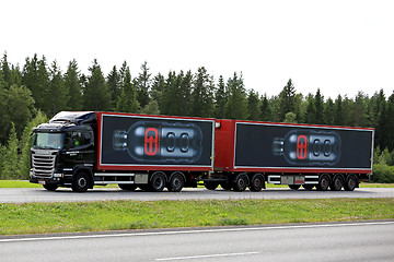 Image showing Black Scania R450 Energy Drink Transport on the Road