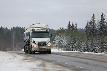 Image showing White Volvo NH12 Semi Tank Truck on Winter Road