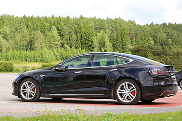 Image showing Black Tesla Model S Electric Car Charging