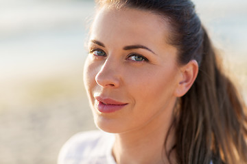 Image showing close up of happy young woman face