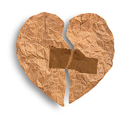Image showing Broken crumpled paper heart coupled with tape