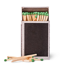 Image showing Open box of matches and several beside