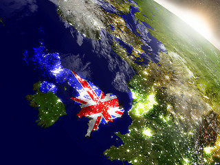 Image showing United Kingdom with flag in rising sun