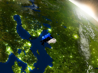 Image showing Estonia with flag in rising sun