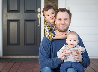 Image showing Mixed Race Father and Sons on Front Porch
