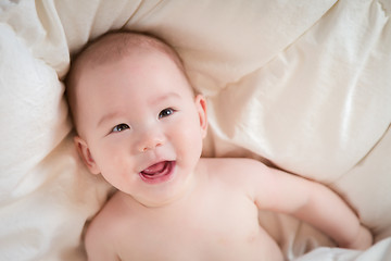 Image showing Mixed Race Baby Boy Having Fun on His Blanket