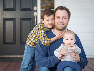 Image showing Mixed Race Father and Sons on Front Porch