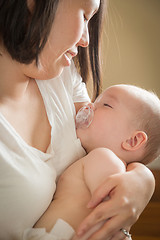 Image showing Mixed Race Chinese and Caucasian Baby Boy with His Mother