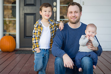 Image showing Mixed Race Father and Sons on Front Porch