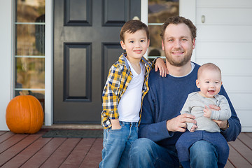 Image showing Mixed Race Father and Sons on Front Porch