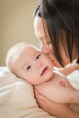 Image showing Mixed Race Chinese and Caucasian Baby Boy Laying In Bed with His