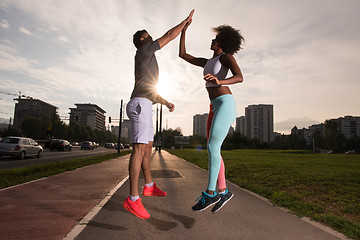 Image showing multiethnic group of people on the jogging