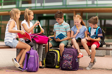 Image showing group of happy elementary school students outdoors