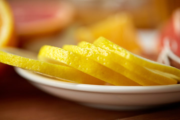 Image showing close up of lemon slices on plate