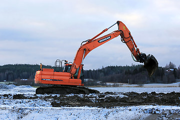 Image showing Excavator at Work in Winter