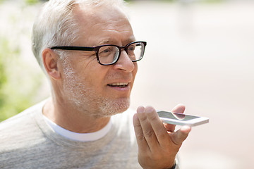 Image showing old man using voice command recorder on smartphone