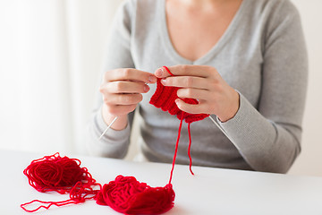 Image showing woman hands knitting with needles and yarn