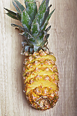 Image showing Sliced pineapple on cutting board