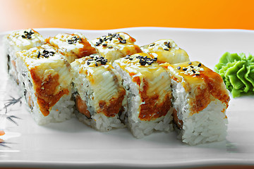 Image showing Canada roll with salmon and eel closeup