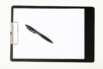 Image showing Black clipboard with a pen isolated