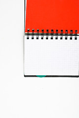 Image showing notepad with pen isolated