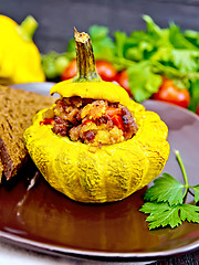 Image showing Squash yellow stuffed in plate on dark board