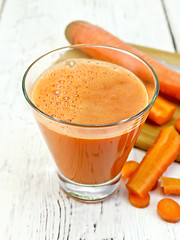 Image showing Juice carrot with vegetables on board