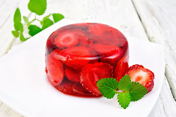 Image showing Jelly strawberry with mint on light board