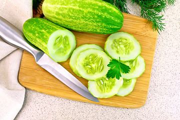 Image showing Cucumber with parsley on table top